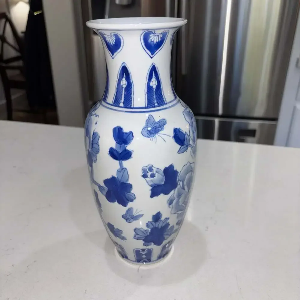 Vintage Blue and White Floral Porcelain Vase with Butterfly Motif
